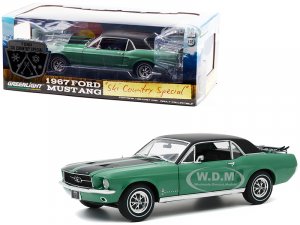 1967 Ford Mustang Coupe Loveland Green Metallic with Black Stripes and Black Top and a Pair of Skis Ski Country Special