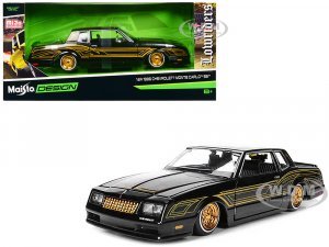 1986 Chevrolet Monte Carlo SS Lowrider Black Metallic with Gold Graphics and Wheels Lowriders Series