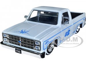 1985 Chevrolet C10 Pickup Truck Lowrider White Metallic with Blue Graphics Street Low Series