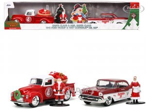 1941 Ford Pickup Truck Red and White Santas Workshop and 1957 Chevrolet Bel Air Red Metallic and White Express 25 with Mr. and Mrs. Santa Claus
