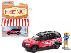 2021 Ford Bronco Sport Pink and Black Off-Roadeo Adventure Support Truck with Backpacker Figurine The Hobby Shop Series 11