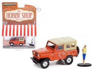 1975 Nissan Patrol Orange with Tan Top and Backpacker Figurine The Hobby Shop Series 12