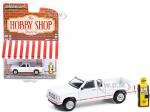 1991 GMC Sonoma ST Pickup Truck White and Vintage Pennzoil Gas Pump The Hobby Shop Series 12