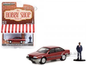 1989 Ford Taurus Red with Black Stripes and Sales Associate in Suit Figure The Hobby Shop Series 13