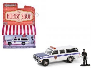 1985 GMC Suburban 2500 New York City Transit Police Department White with Blue Stripes and Police Officer Figure The Hobby Shop Series 16